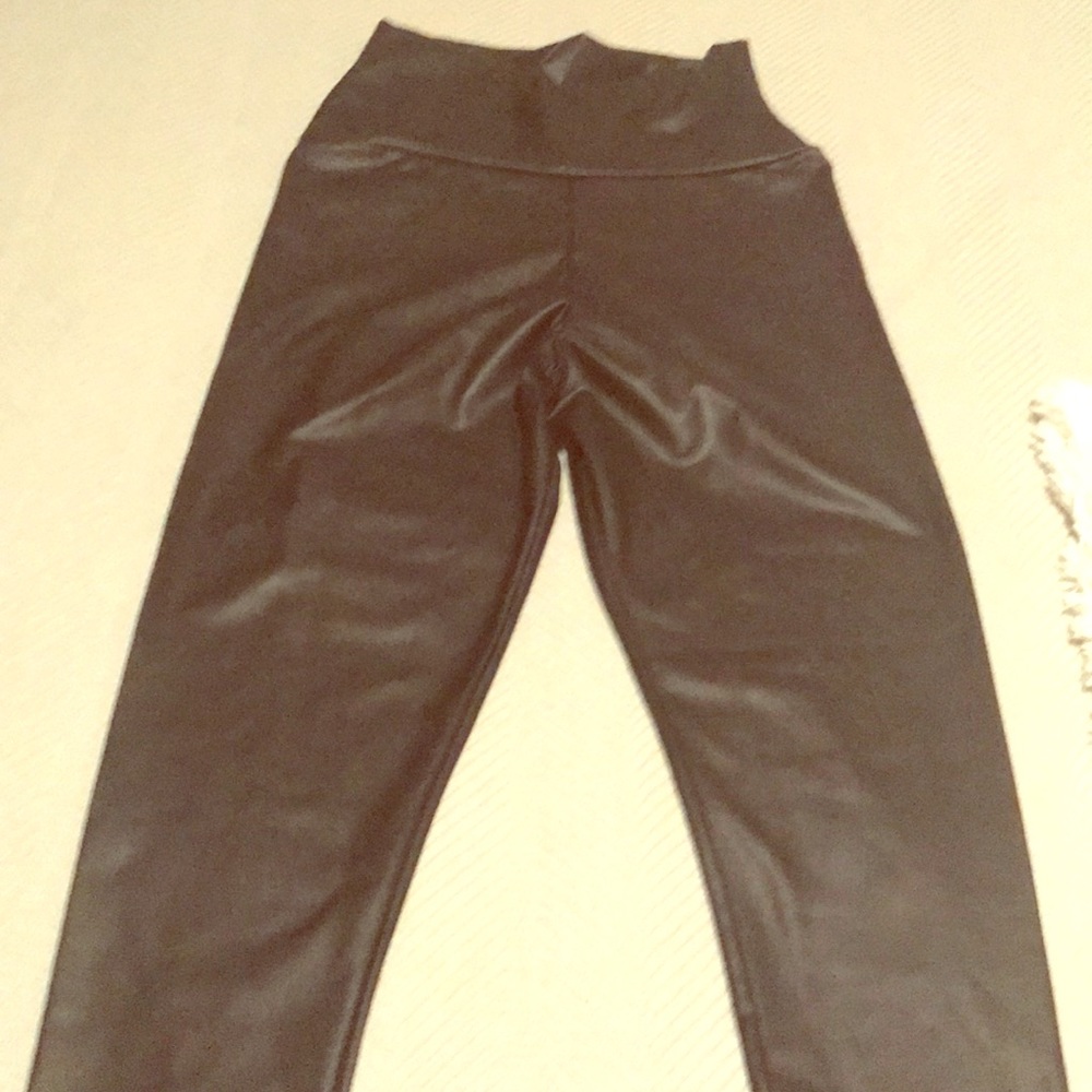 Never worn faux leather leggings size small